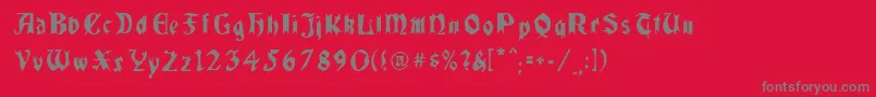 Quaelgothiccondensed Font – Gray Fonts on Red Background