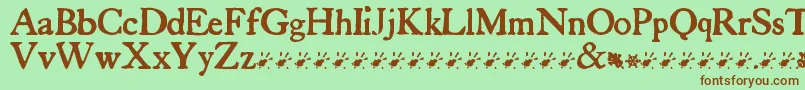 TuersCardboard-Schriftart – Braune Schriften auf grünem Hintergrund
