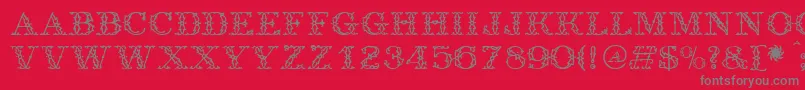 フォントAntique – 赤い背景に灰色の文字