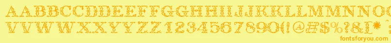 フォントAntique – オレンジの文字が黄色の背景にあります。