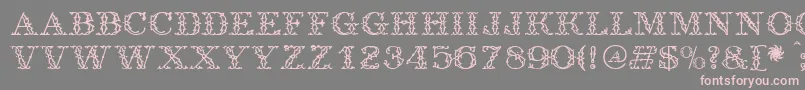 Antique-fontti – vaaleanpunaiset fontit harmaalla taustalla