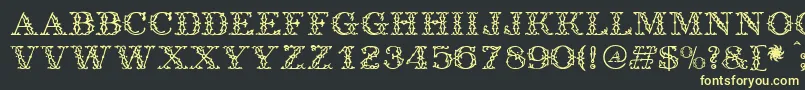 Antique-fontti – keltaiset fontit mustalla taustalla