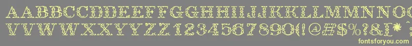 Antique-fontti – keltaiset fontit harmaalla taustalla