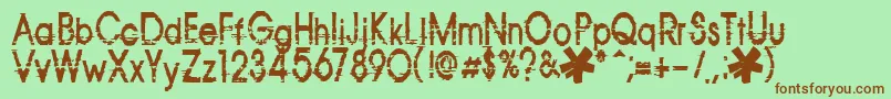 Corazon-Schriftart – Braune Schriften auf grünem Hintergrund