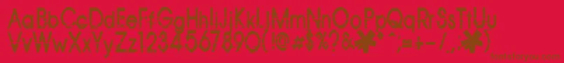 Corazon-Schriftart – Braune Schriften auf rotem Hintergrund