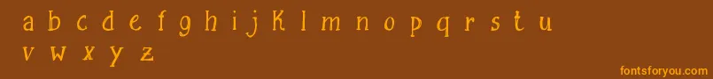 Шрифт FreesketchingFreeDemo – оранжевые шрифты на коричневом фоне
