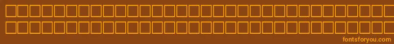 HairRegular-Schriftart – Orangefarbene Schriften auf braunem Hintergrund
