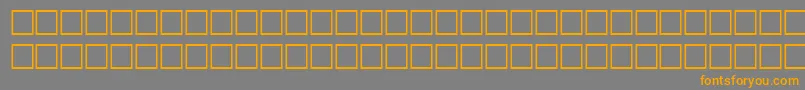 フォントHairRegular – オレンジの文字は灰色の背景にあります。