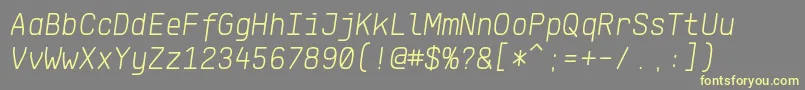 Fonte KlartextMonoLightItalic – fontes amarelas em um fundo cinza