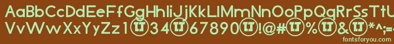 LjDesignStudiosIsBold-fontti – vihreät fontit ruskealla taustalla