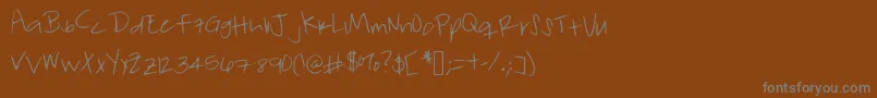 フォントForgetfulfriday – 茶色の背景に灰色の文字