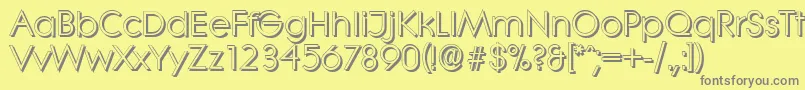 Fonte LiterashadowRegular – fontes cinzas em um fundo amarelo