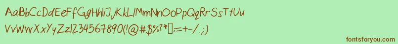 フォントCatshandwriting – 緑の背景に茶色のフォント
