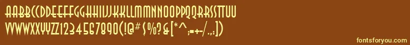 AnnaItcTt-fontti – keltaiset fontit ruskealla taustalla