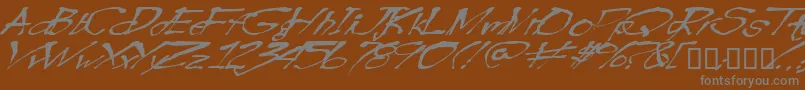 Blottooowobbly-Schriftart – Graue Schriften auf braunem Hintergrund