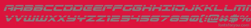 フォントGunshiplaserital – 赤い背景に灰色の文字