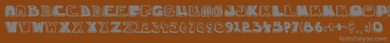 ChuckaSketch3 Font – Gray Fonts on Brown Background