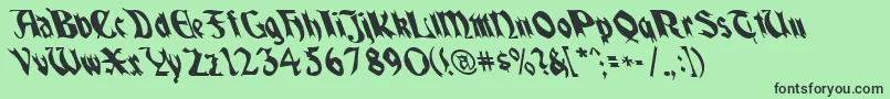 Quaelgothiclefty-Schriftart – Schwarze Schriften auf grünem Hintergrund