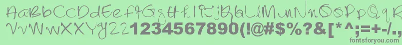 フォントLalithabai – 緑の背景に灰色の文字