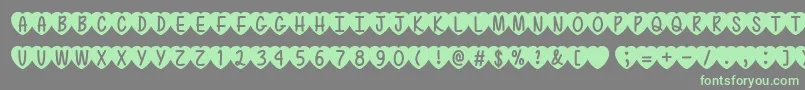 LoveIsAwesome2Ttf-Schriftart – Grüne Schriften auf grauem Hintergrund