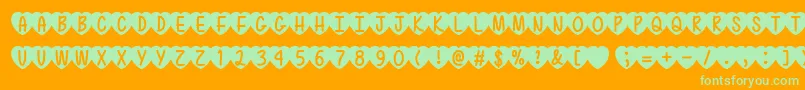 LoveIsAwesome2Ttf-fontti – vihreät fontit oranssilla taustalla