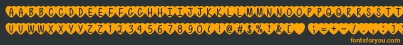 フォントLoveIsAwesome2Ttf – 黒い背景にオレンジの文字