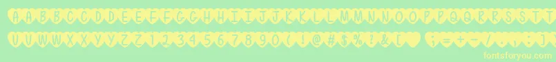 LoveIsAwesome2Ttf Font – Yellow Fonts on Green Background