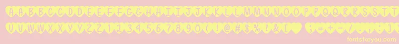 Fonte LoveIsAwesome2Ttf – fontes amarelas em um fundo rosa