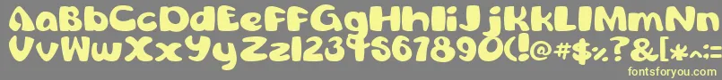 ComicConch Font – Yellow Fonts on Gray Background