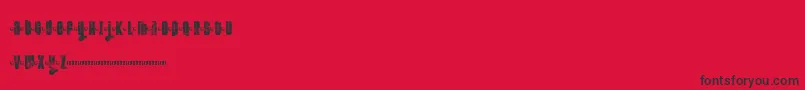 Fonte FtKolariDemoLight – fontes pretas em um fundo vermelho