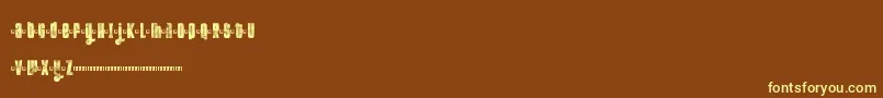 FtKolariDemoLight Font – Yellow Fonts on Brown Background