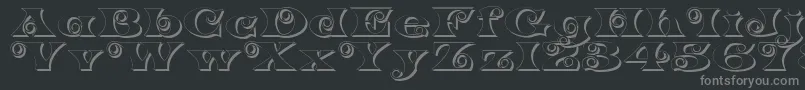 Czcionka K22SpiralSwashShadow – szare czcionki na czarnym tle