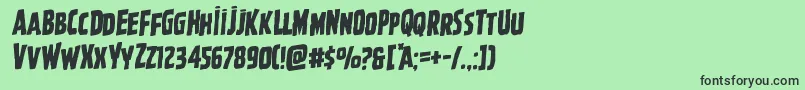 フォントGhoulishintentrotal – 緑の背景に黒い文字