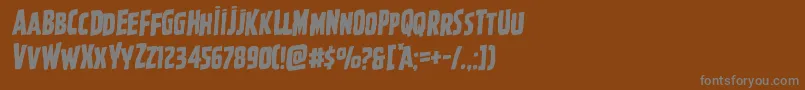 Ghoulishintentrotal Font – Gray Fonts on Brown Background