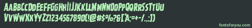 フォントGhoulishintentrotal – 黒い背景に緑の文字