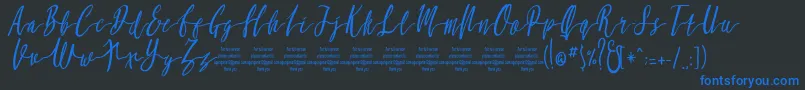 MollucaItalicFree Font – Blue Fonts on Black Background