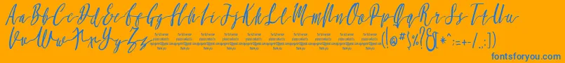 MollucaItalicFree-Schriftart – Blaue Schriften auf orangefarbenem Hintergrund