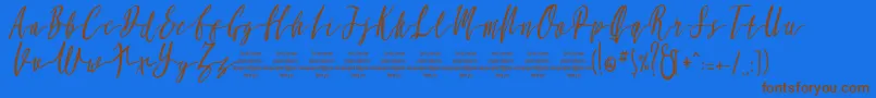 MollucaItalicFree-Schriftart – Braune Schriften auf blauem Hintergrund