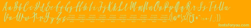 MollucaItalicFree-Schriftart – Grüne Schriften auf orangefarbenem Hintergrund