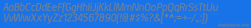 フォントXenurgItalic – 青い背景に灰色の文字