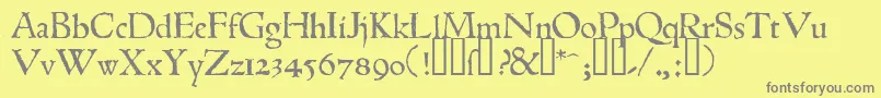 1543humaneJenson-fontti – harmaat kirjasimet keltaisella taustalla