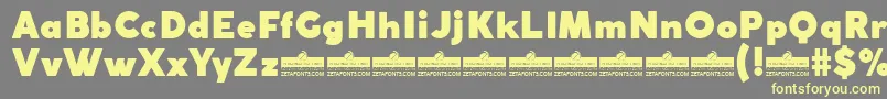 CocogothicFatTrial Font – Yellow Fonts on Gray Background