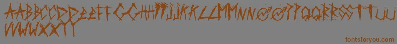 ScratchedCarPaint-Schriftart – Braune Schriften auf grauem Hintergrund