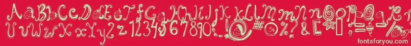 Starberryswirldelight-Schriftart – Grüne Schriften auf rotem Hintergrund
