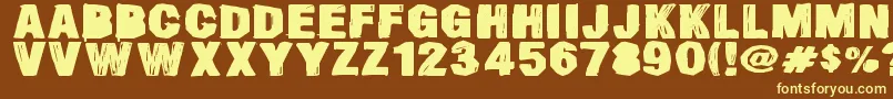 フォントSmearedDsg – 黄色のフォント、茶色の背景