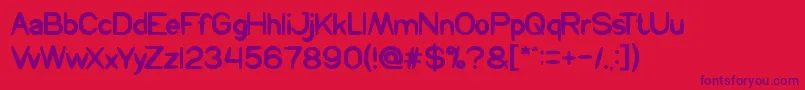 Prehistoric Font – Purple Fonts on Red Background