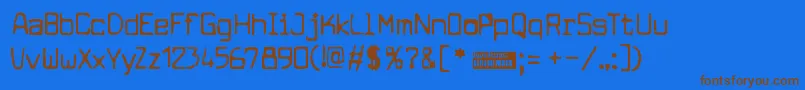 フォントCuomotyp – 茶色の文字が青い背景にあります。