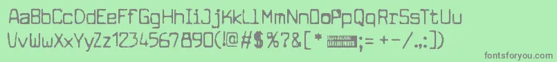 Cuomotyp Font – Gray Fonts on Green Background