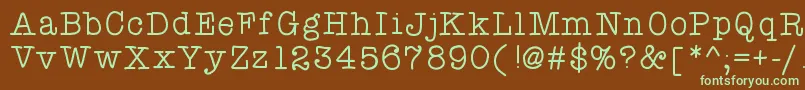 フォントAtypewriterforme – 緑色の文字が茶色の背景にあります。