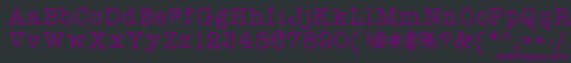 Czcionka Atypewriterforme – fioletowe czcionki na czarnym tle